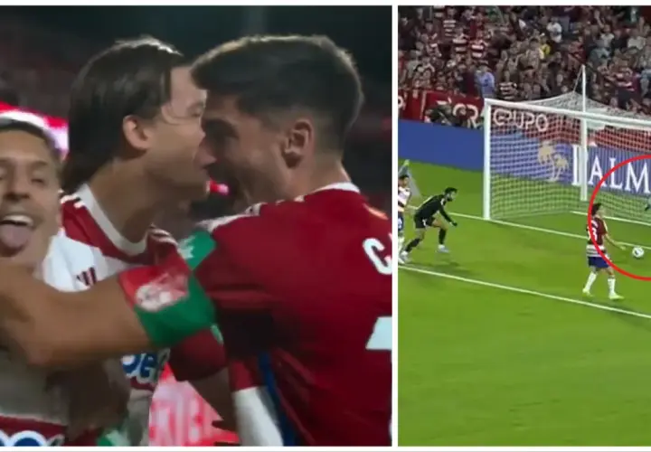 Radość zawodników Granada CF po strzelonym golu. Na drugim planie akcja pod bramką, gdzie piłkarz w jasnym stroju z numerem 27 biegnie do piłki.